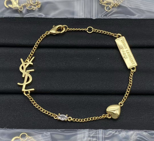 Bracelet doré Ysl